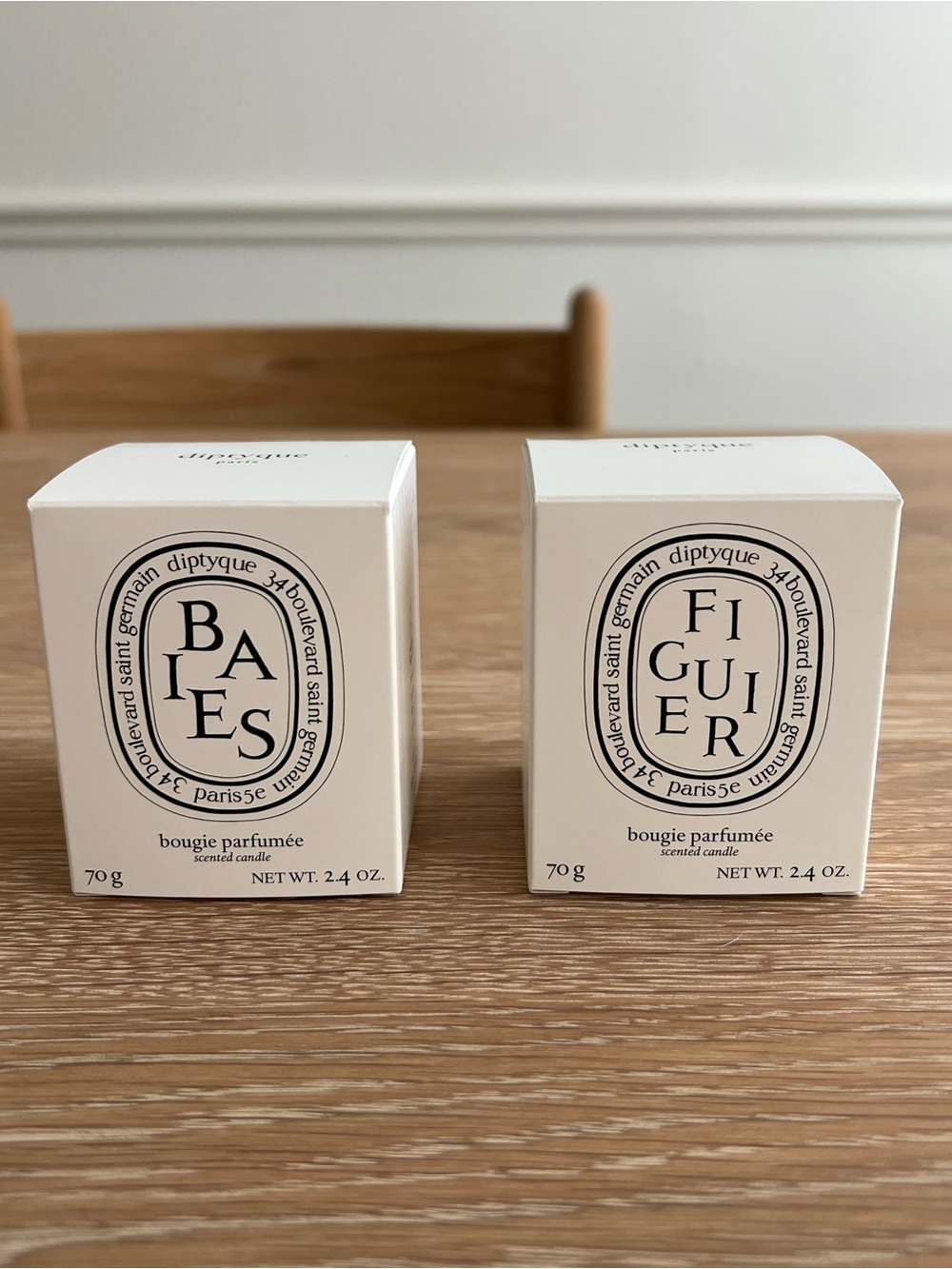 Pair of diptyque 70g candles